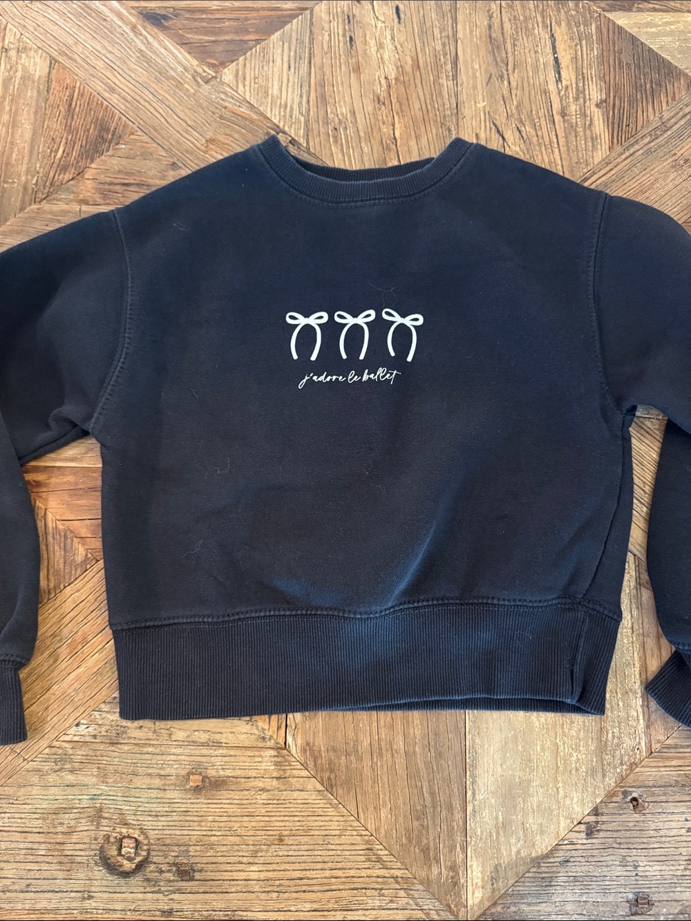 Girls Black Crewneck Sweatshirt with Bow Graphic